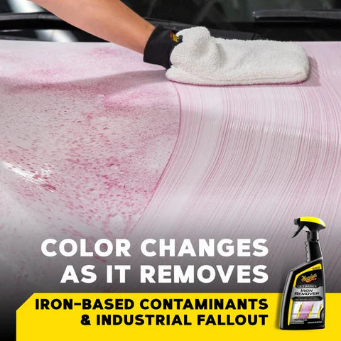 Person cleaning a car with a white towel, showing iron stains being removed, with Meguiar's Iron Remover product displayed.