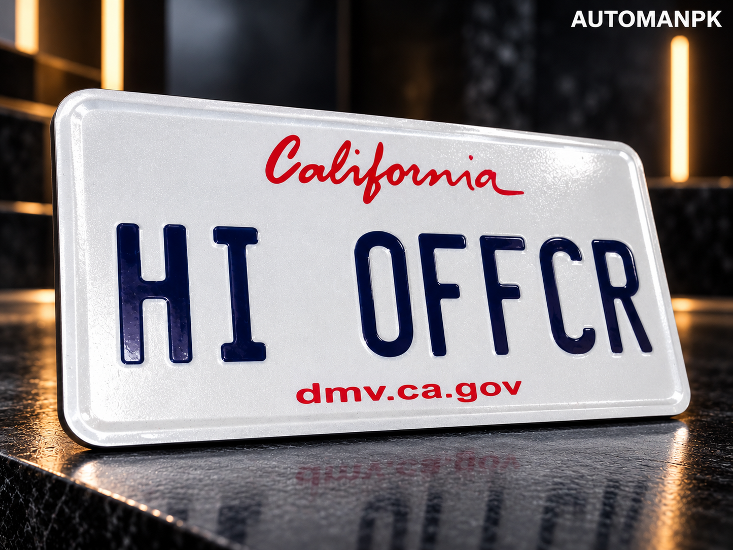 California style custom steel name plate close-up showing red and blue lettering