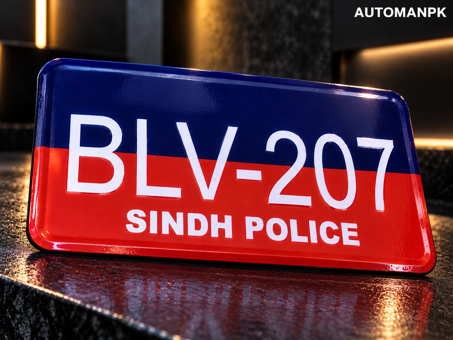Close-up of a Sindh Police 2 number plate replica with blue and red design and white lettering