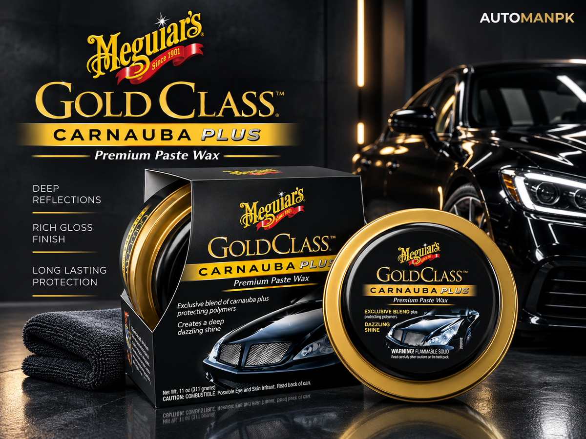 Meguiar's Gold Class Carnauba Plus premium paste wax shown with its retail box and a round tin on a dark studio set, alongside a black car and a black microfiber cloth. The Meguiar's branding and product name are prominently visible.